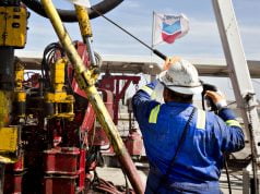 Chevron is writing down as much as $11 billion worth of assets, and it could cost the entire market